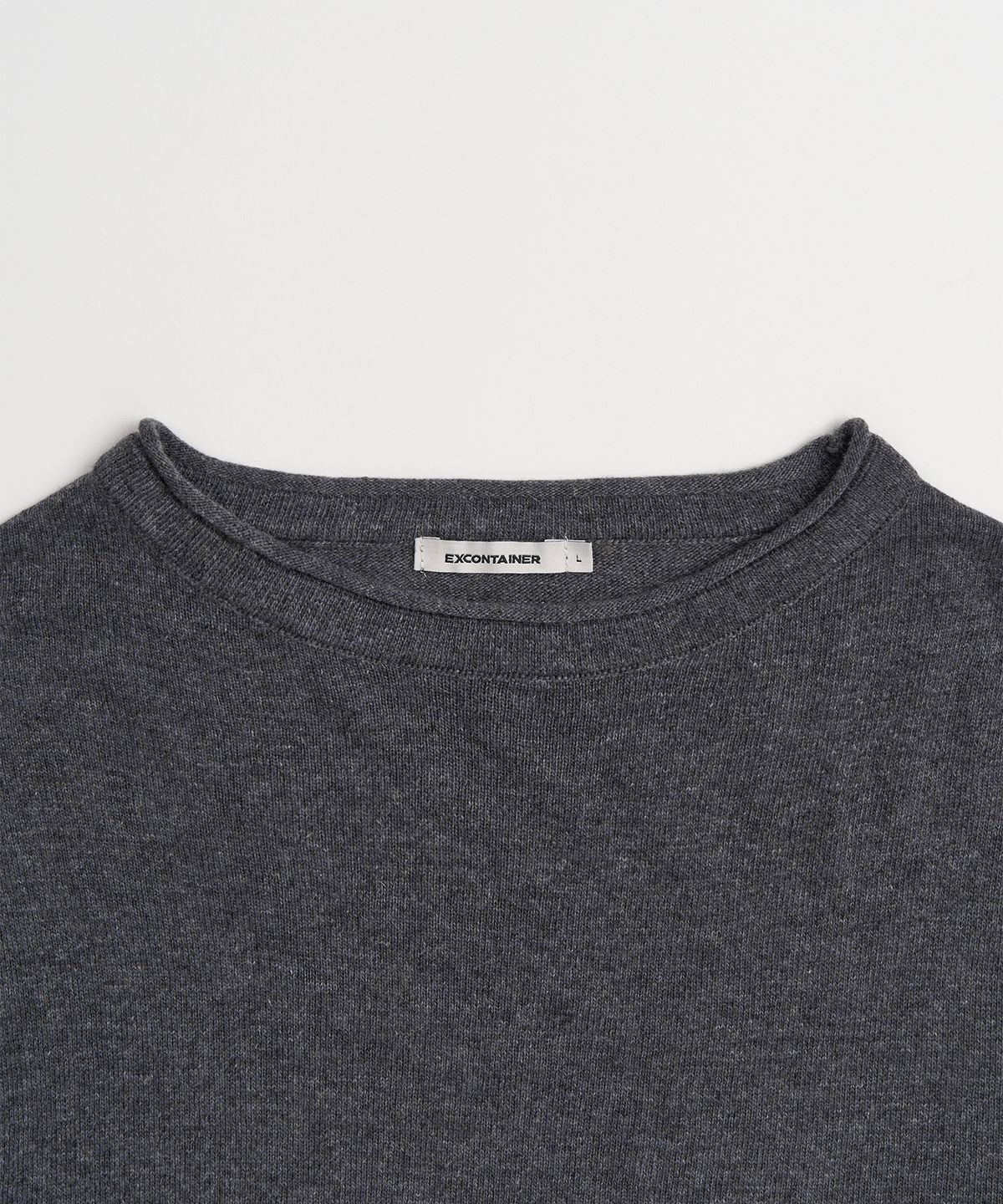 엑스컨테이너(EXCONTAINER) 롤링 크롭 니트 (CHARCOAL)