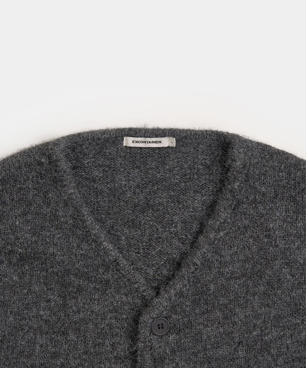 엑스컨테이너(EXCONTAINER) 헤어리 브이넥 크롭 가디건 (CHARCOAL)