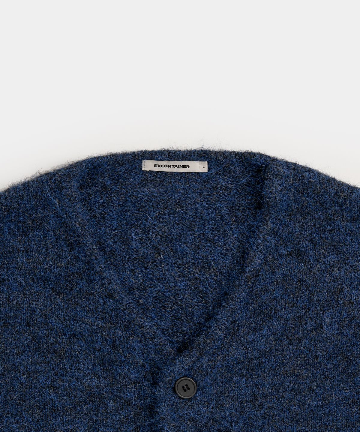 엑스컨테이너(EXCONTAINER) 헤어리 브이넥 크롭 가디건 (DARK NAVY)