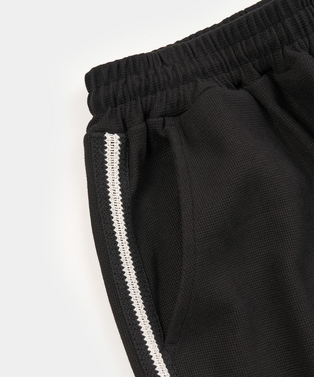 엑스컨테이너(EXCONTAINER) 와플 사이드 라인 트랙 팬츠 (BLACK)