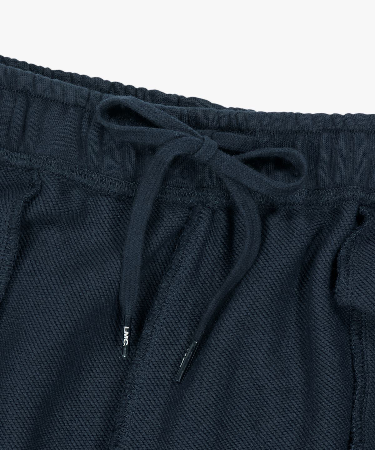 엘엠씨(LMC) SUNFADE BLUR LOGO SWEAT PANTS navy