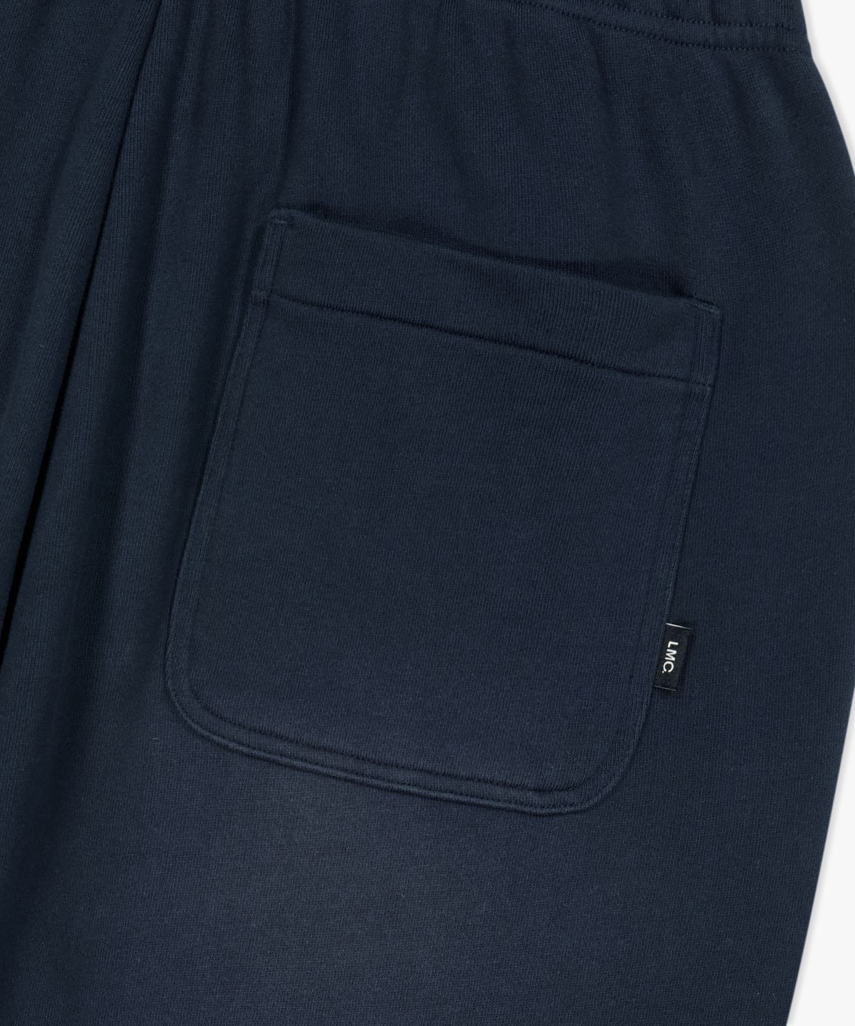 엘엠씨(LMC) SUNFADE BLUR LOGO SWEAT PANTS navy