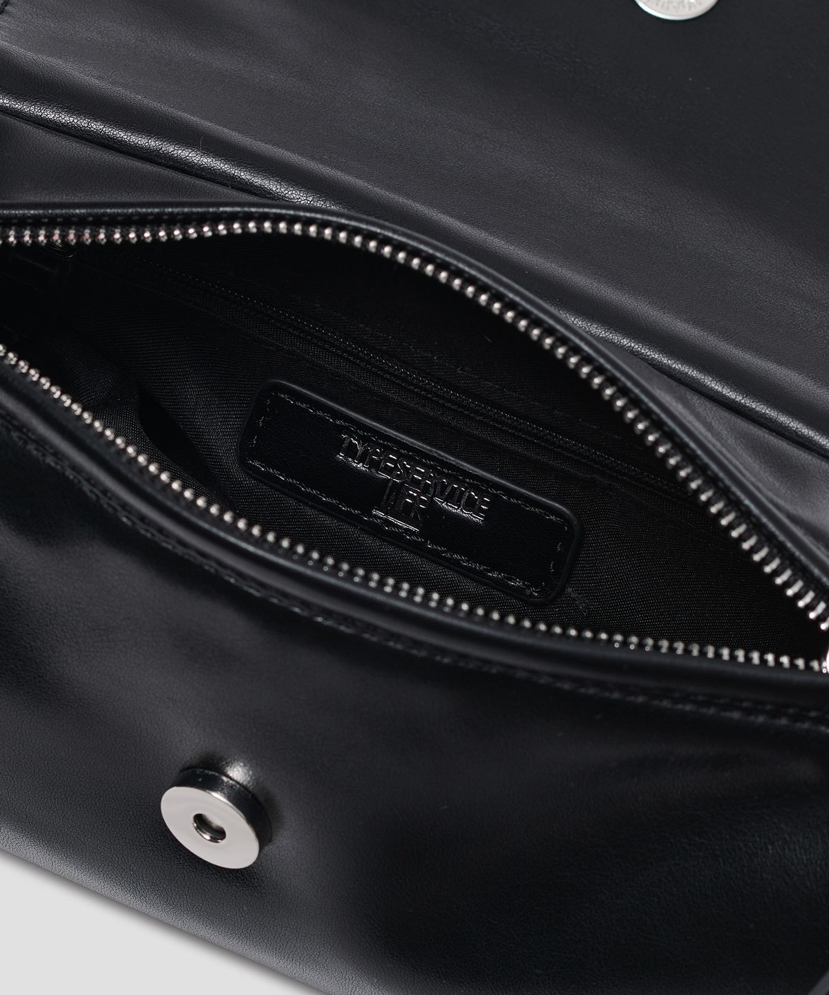 타입서비스(TYPESERVICE) Dot Perforated Shoulder Bag [Black]