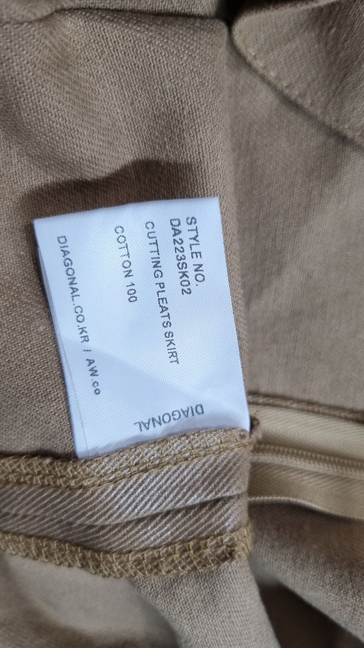 다이애그널(DIAGONAL) CUTTING PLEATS SKIRT (beige) M