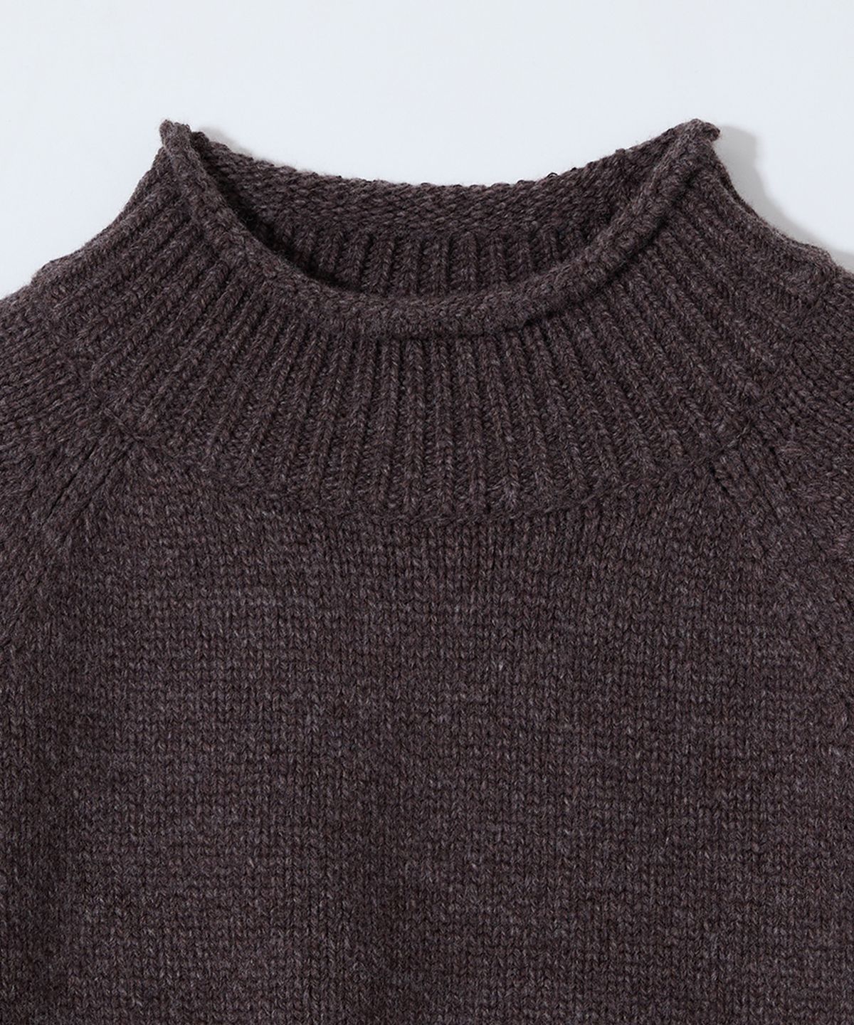 홀리선(HORLISUN) Fjord Roll Neck Pocket Knit Melange Brown