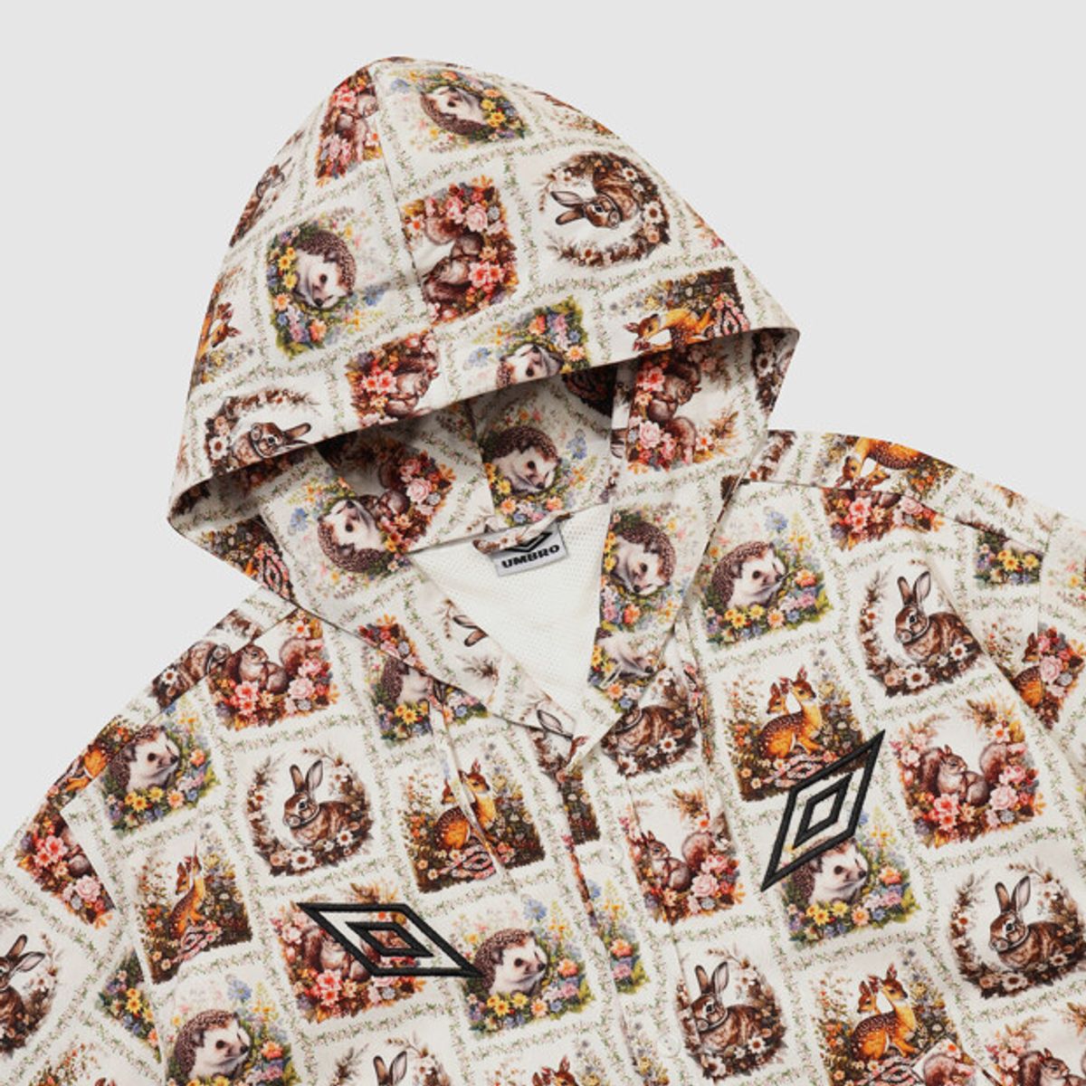 엄브로(UMBRO) [UMB X SLAM JAM] 커브 마스크 그래픽 셔츠 자켓 패턴 UR311OJK92