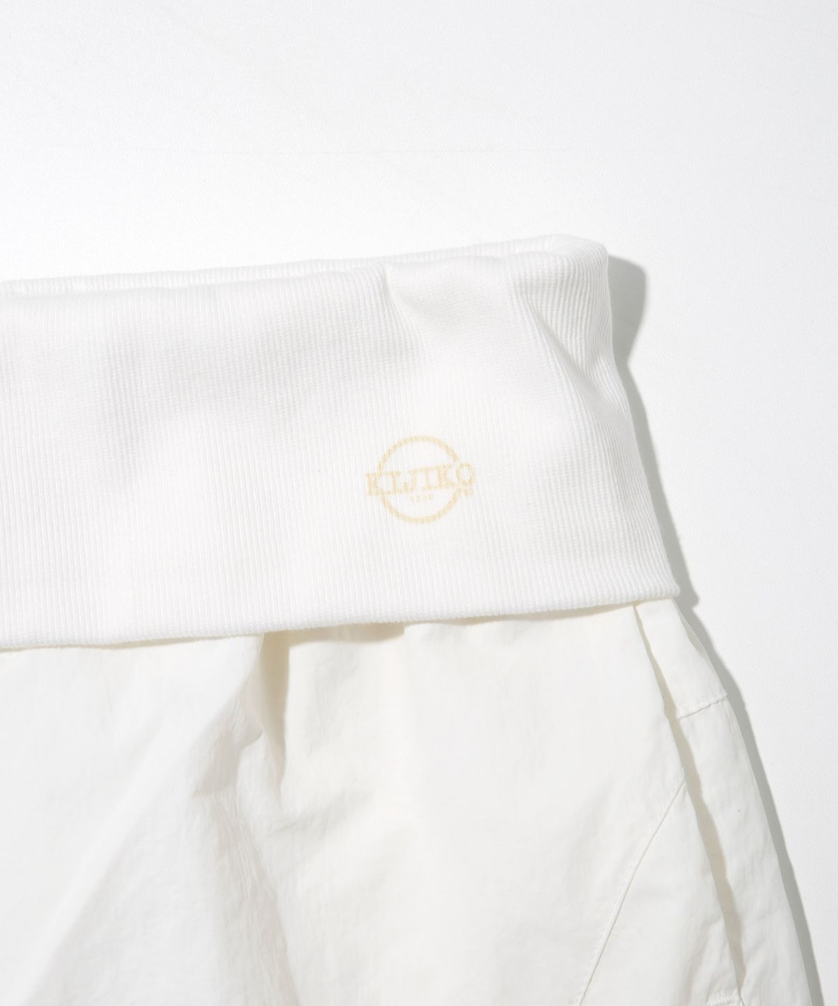키지코(KIJIKO) ke619. Eyelet Folding Nylon Pants White