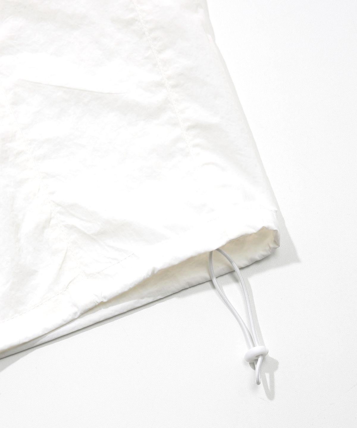키지코(KIJIKO) ke619. Eyelet Folding Nylon Pants White