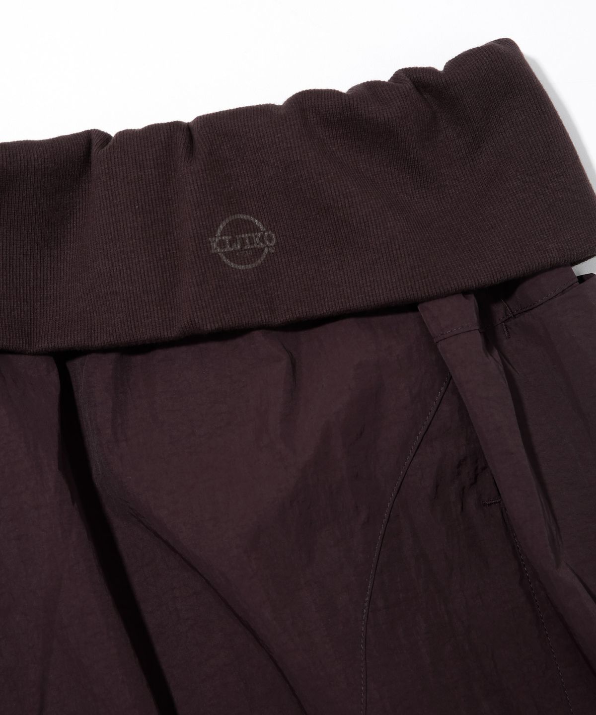 키지코(KIJIKO) ke619. Eyelet Folding Nylon Pants Burgundy