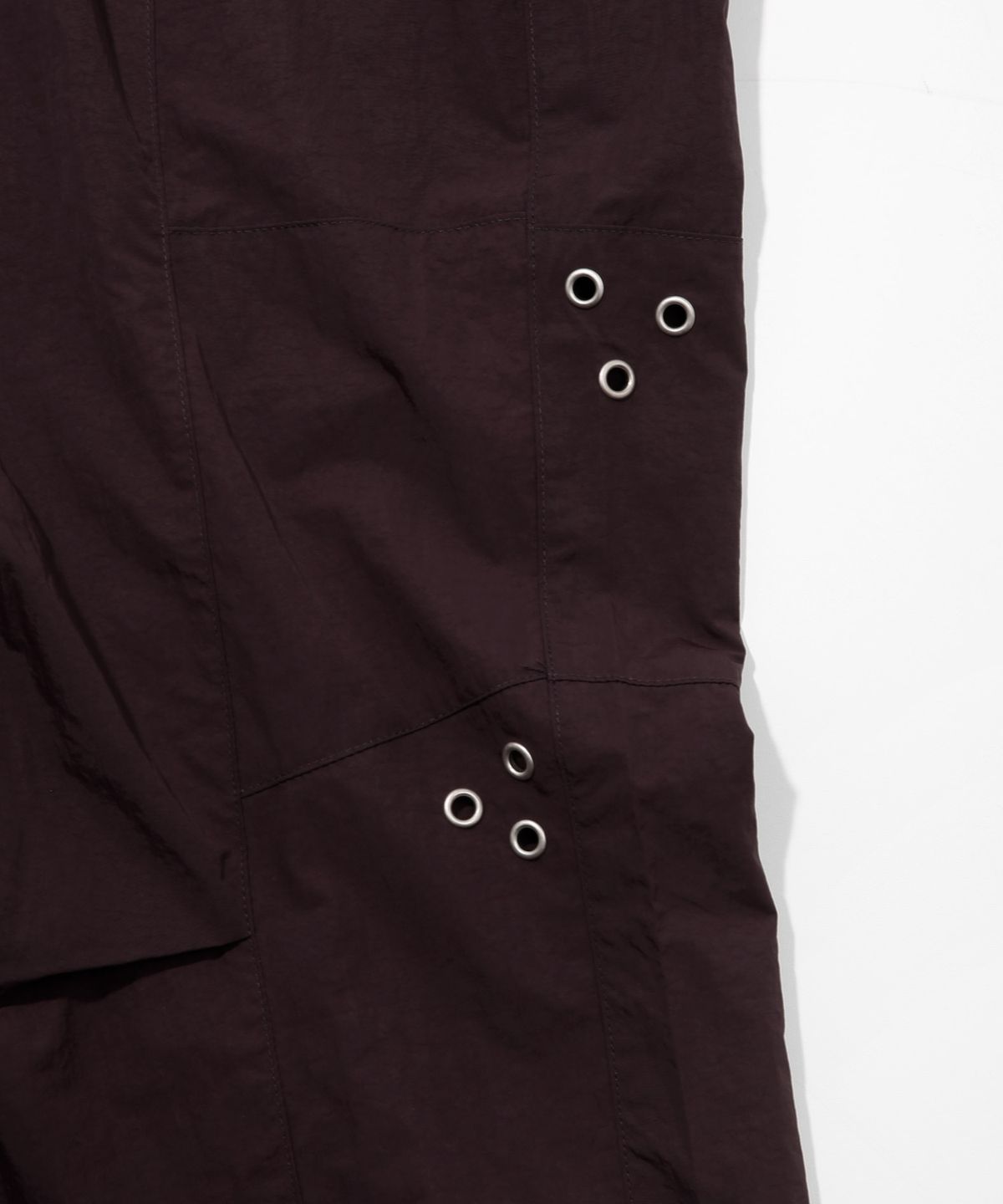 키지코(KIJIKO) ke619. Eyelet Folding Nylon Pants Burgundy