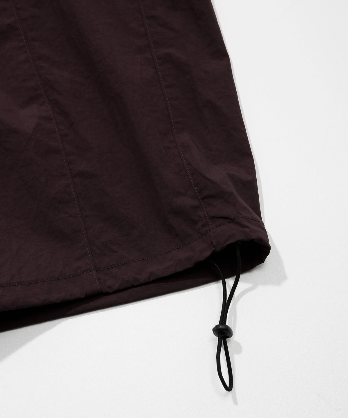 키지코(KIJIKO) ke619. Eyelet Folding Nylon Pants Burgundy