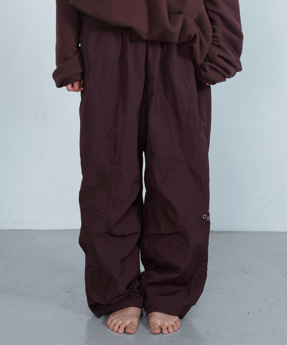 키지코(KIJIKO) ke619. Eyelet Folding Nylon Pants Burgundy