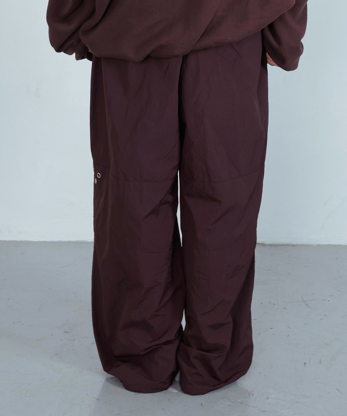 키지코(KIJIKO) ke619. Eyelet Folding Nylon Pants Burgundy