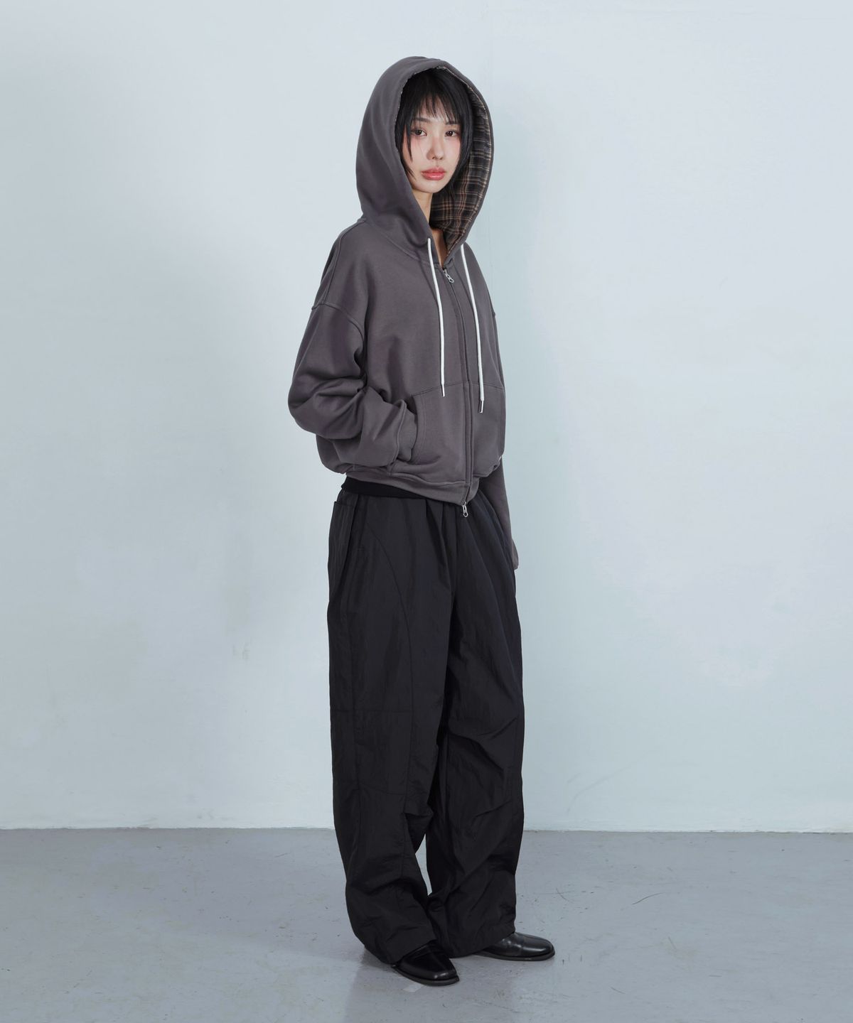 키지코(KIJIKO) ke619. Eyelet Folding Nylon Pants Black