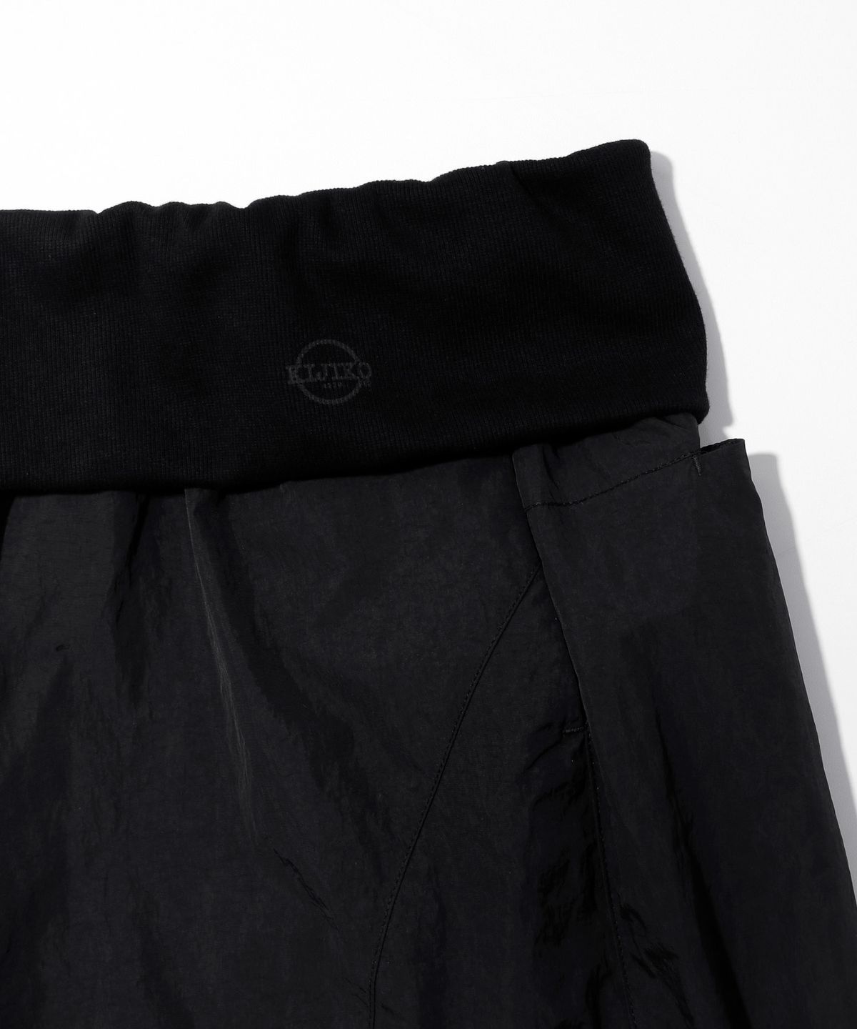 키지코(KIJIKO) ke619. Eyelet Folding Nylon Pants Black