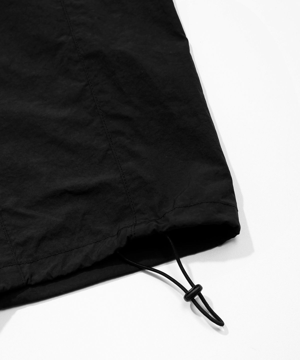 키지코(KIJIKO) ke619. Eyelet Folding Nylon Pants Black