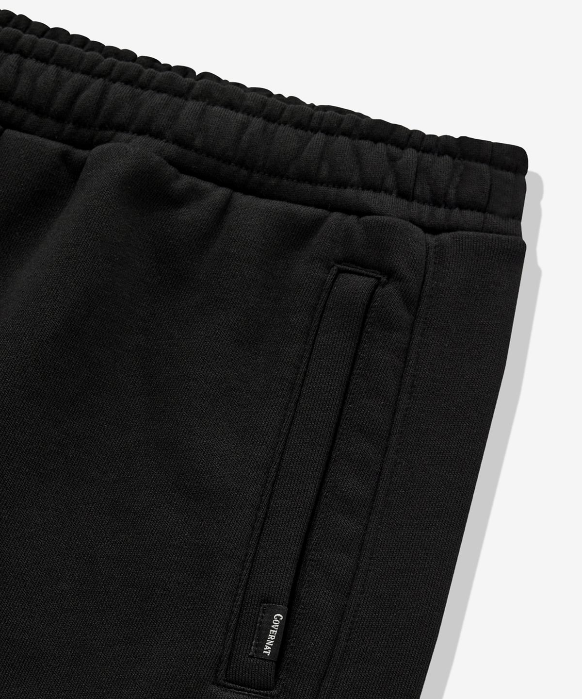 커버낫(COVERNAT) 루즈 스트레이트 커브드 스웻 팬츠 블랙
