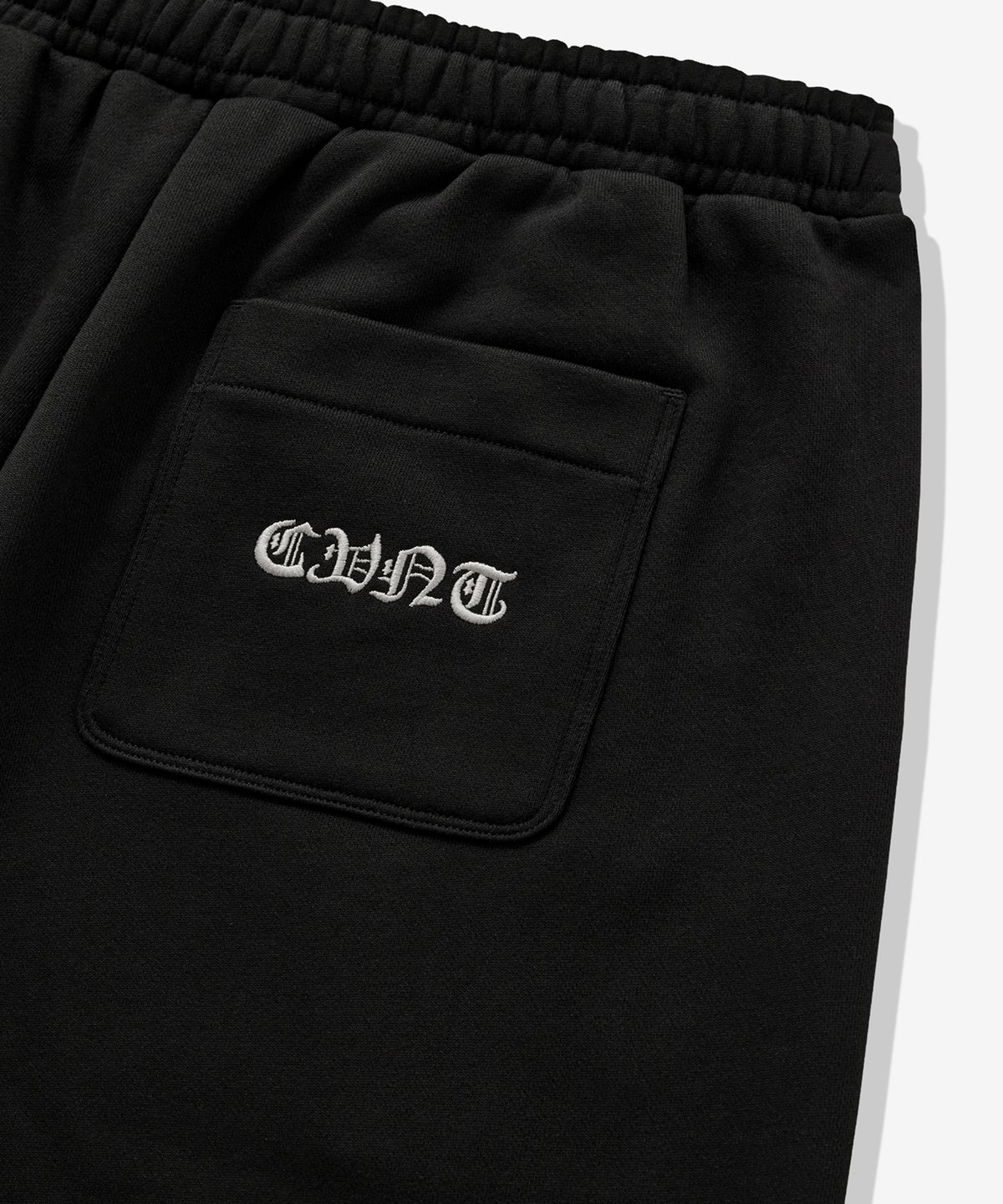커버낫(COVERNAT) 루즈 스트레이트 커브드 스웻 팬츠 블랙