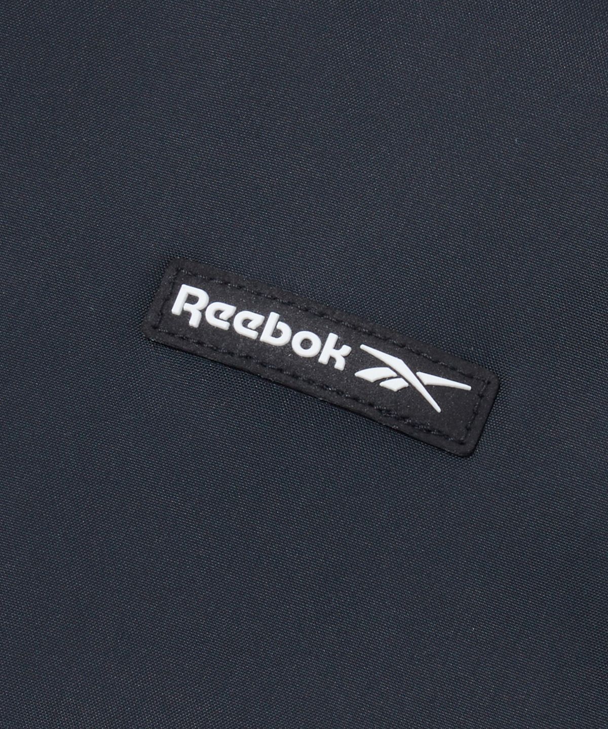 리복(REEBOK) 스포티 패딩 봄버 자켓 - 블랙