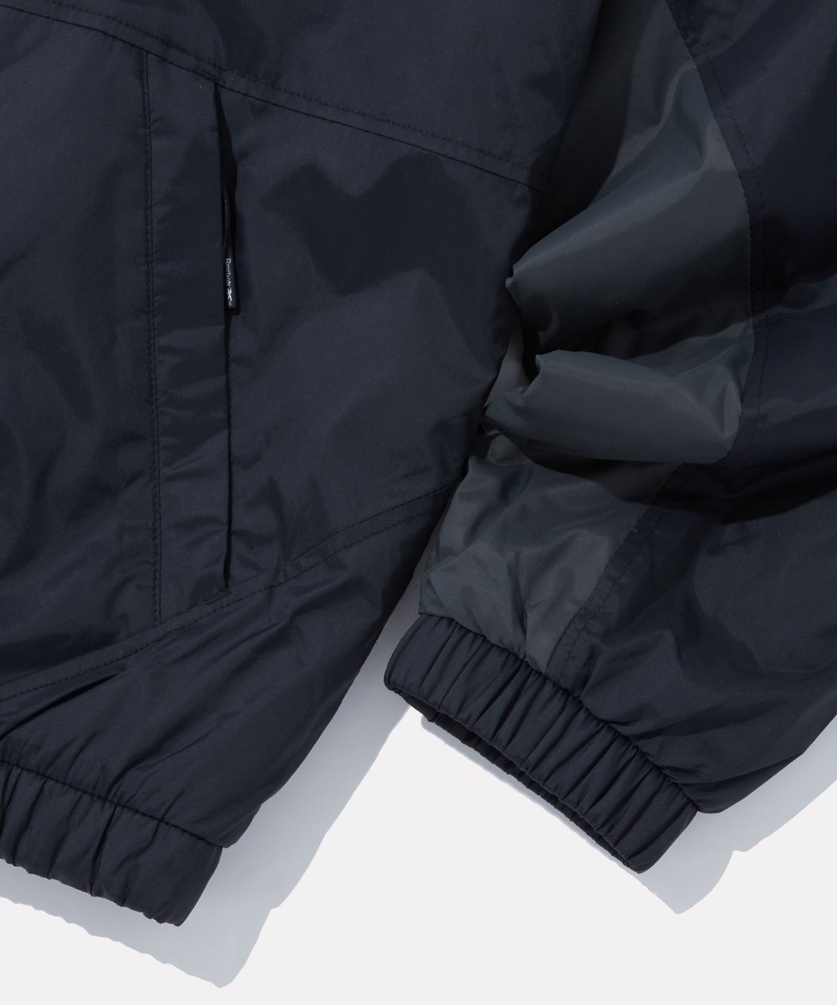 리복(REEBOK) 스포티 패딩 봄버 자켓 - 블랙