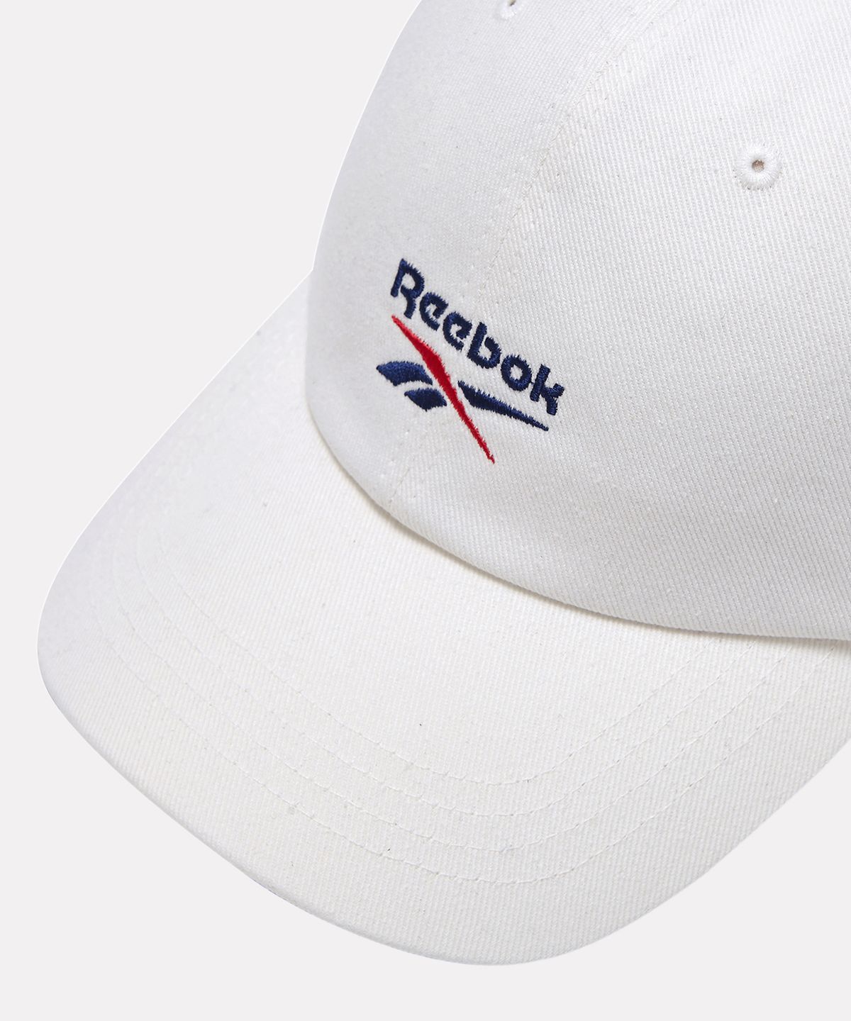 리복(REEBOK) 에센셜 로고 볼캡 - 오프 화이트