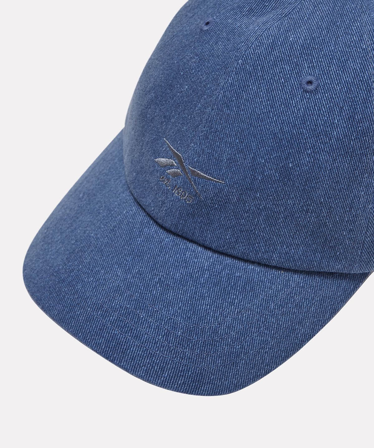 리복(REEBOK) 벡터 워싱 볼캡 - 인디고