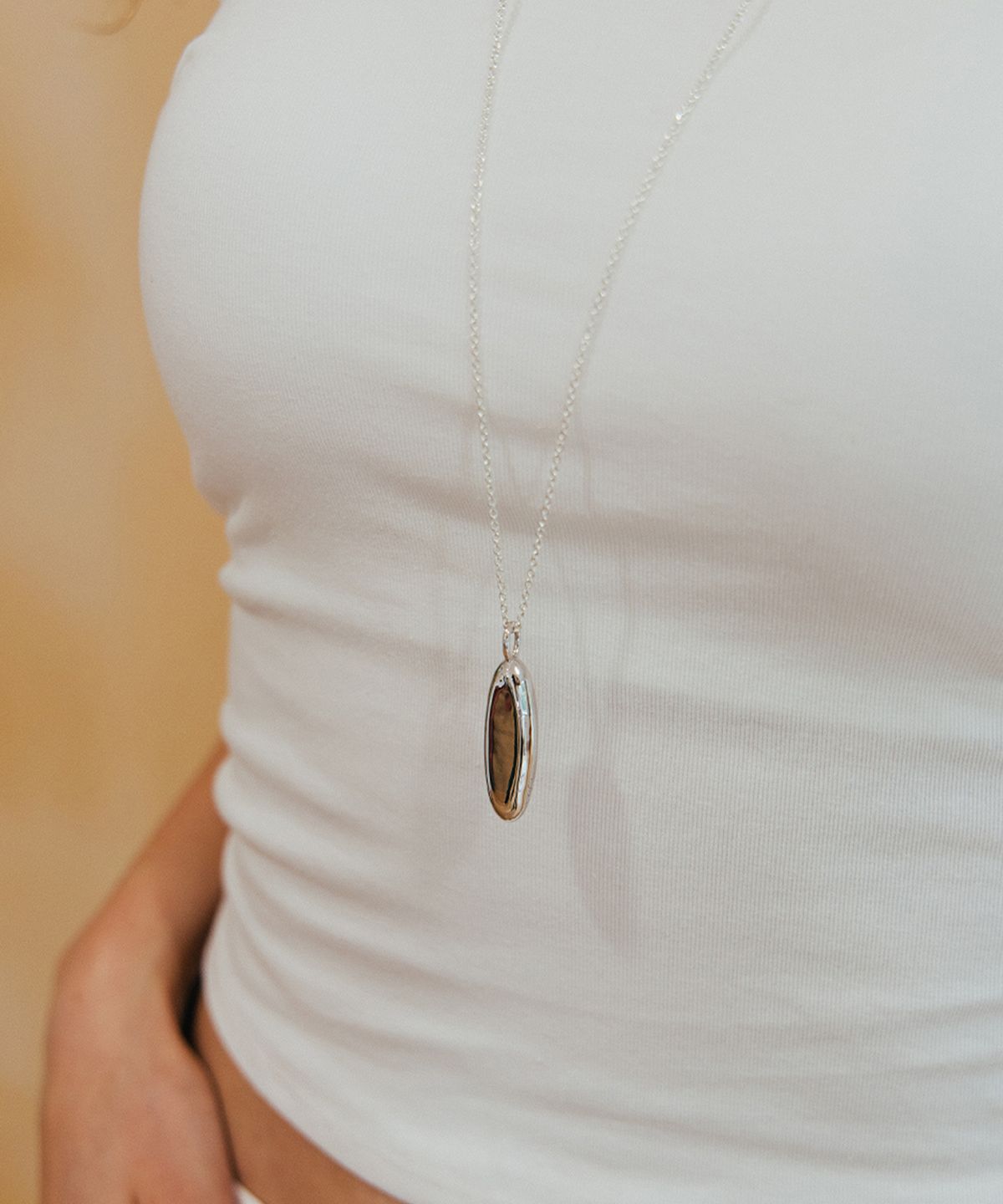 피오레(FIORE) oval pebble long necklace