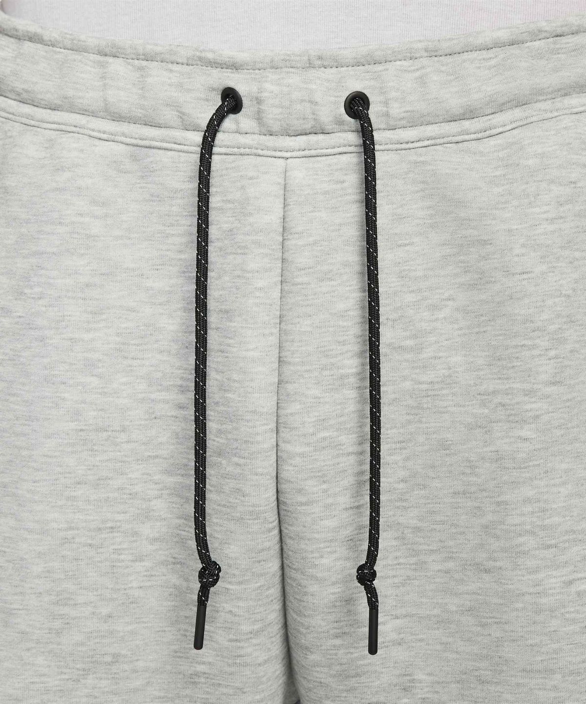 나이키(NIKE) 테크 오픈 헴 플리스 팬츠 M - 다크 그레이 헤더:블랙 / IM0698-063