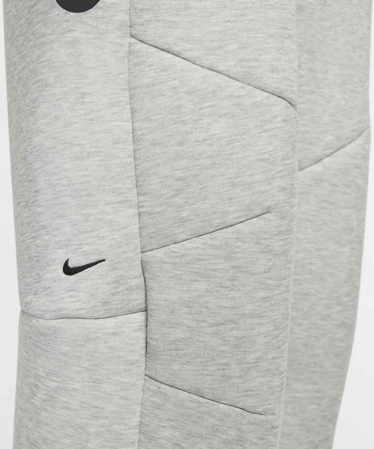 나이키(NIKE) 테크 오픈 헴 플리스 팬츠 M - 다크 그레이 헤더:블랙 / IM0698-063