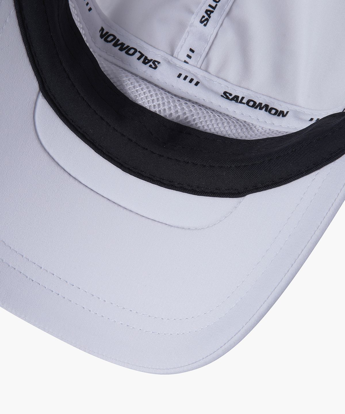 살로몬(SALOMON) 트레일 그릿 블록 캡_LD0424400