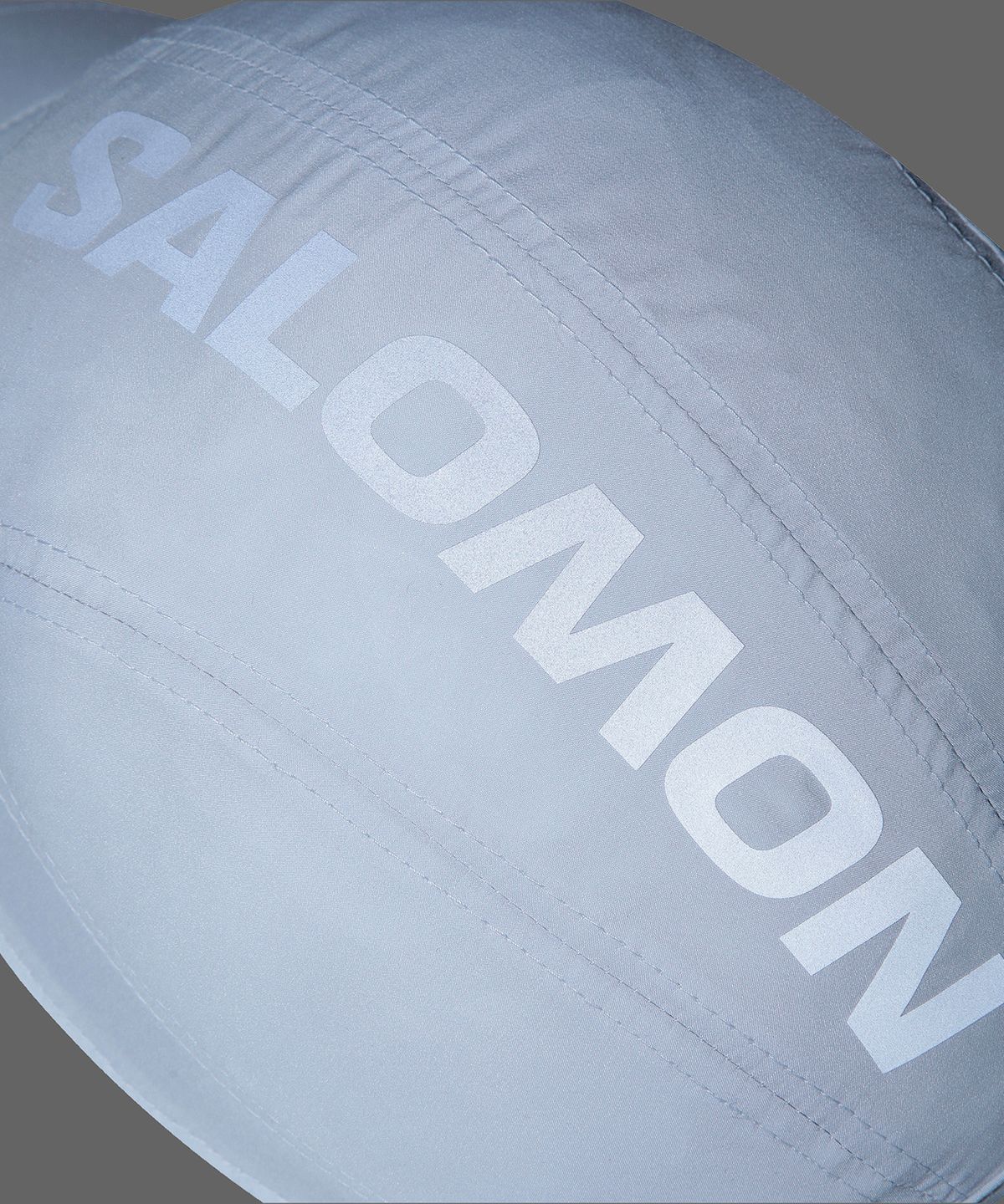 살로몬(SALOMON) 트레일 그릿 블록 캡_LD0424400