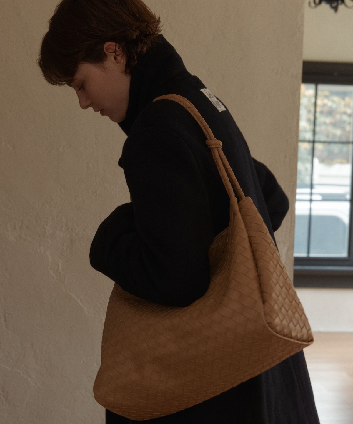 아노에틱(ANOETIC) ANC WEAVING MESH STRING BAG_CAMEL