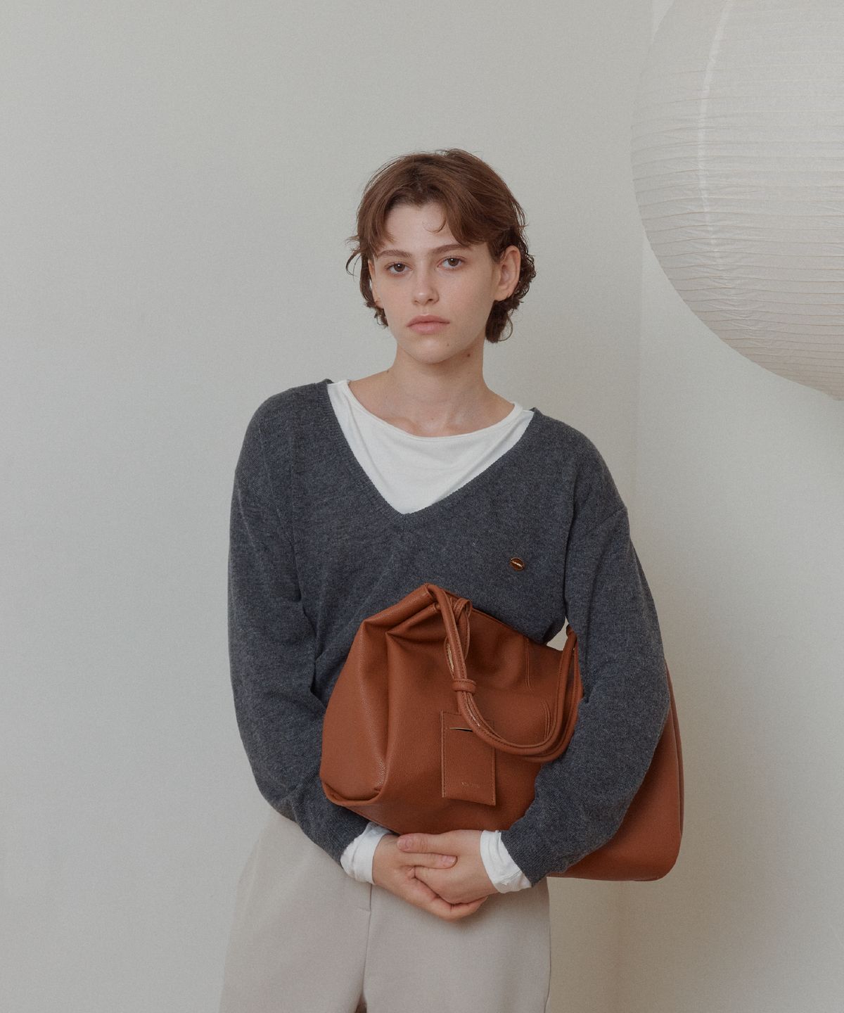 아노에틱(ANOETIC) ANC SOFT STRING BAG_CAMEL