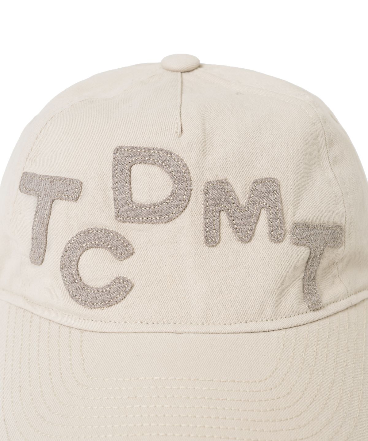 더콜디스트모먼트(THECOLDESTMOMENT) TCM logo typo cap (light grey)