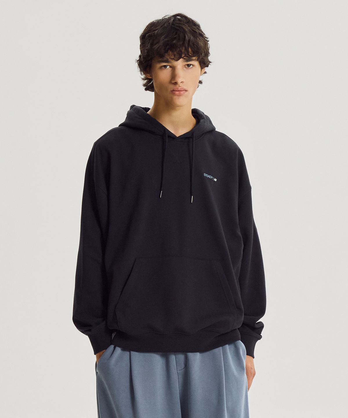 뉴발란스(NEW BALANCE) NBN0G41923 / UNI 헤리티지 ORBIT 그래픽 후드티 (BLACK)