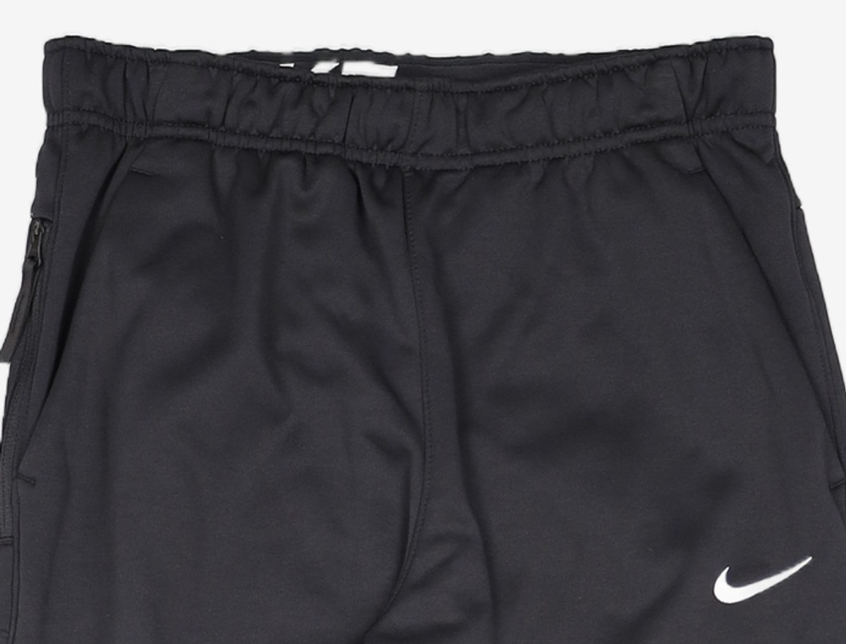 나이키(NIKE) 써마 핏 테이퍼드 트레이닝 팬츠 M - 블랙:화이트 / DQ5406-010 M