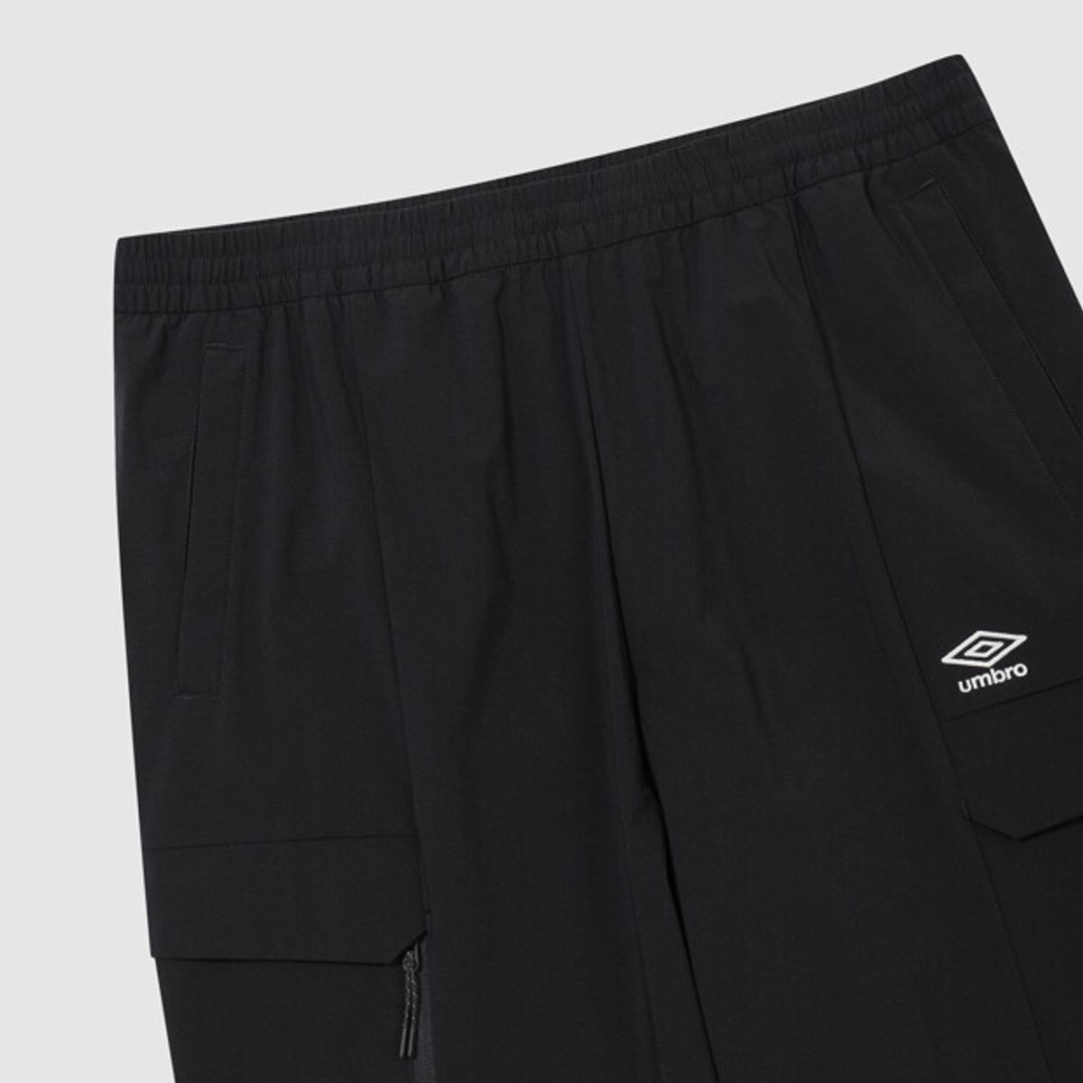 엄브로(UMBRO) 올라운드 나일론 스판 카고 조거 팬츠 블랙 UR323SPT92