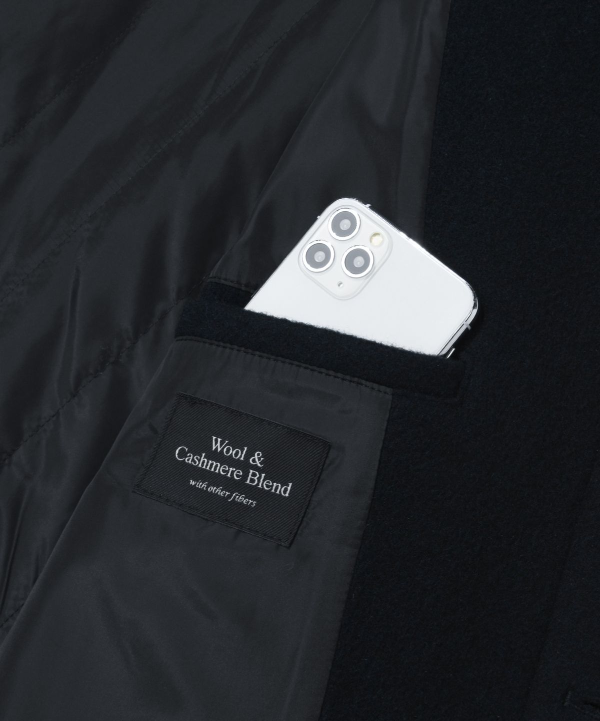 키뮤어(KIIMUIR) [Drape Wool] 캐시미어블렌드 세미오버핏 포켓 발마칸 코트_네이비