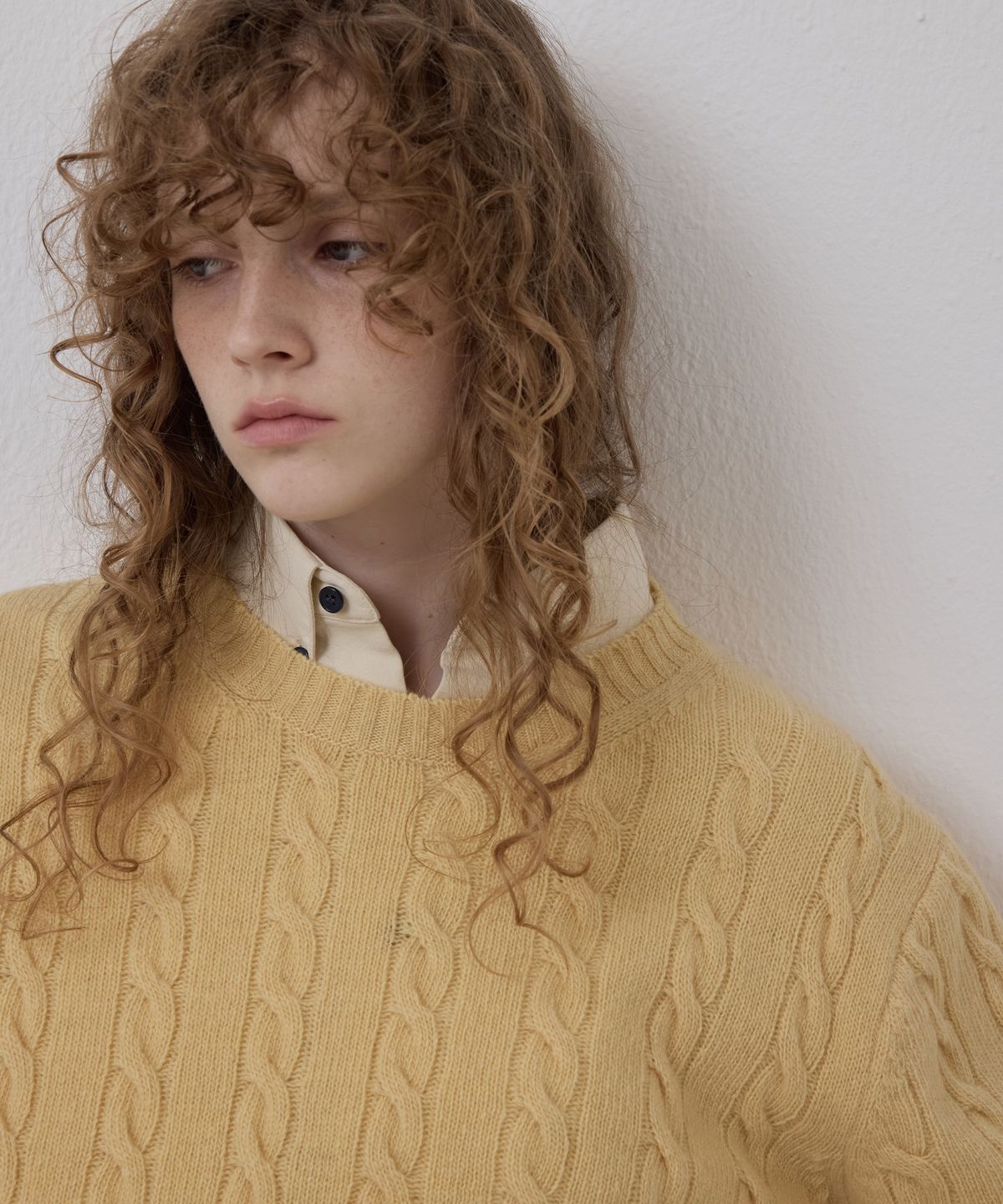 노앙(NOHANT) CORSET CUFF CABLE KNIT YELLOW