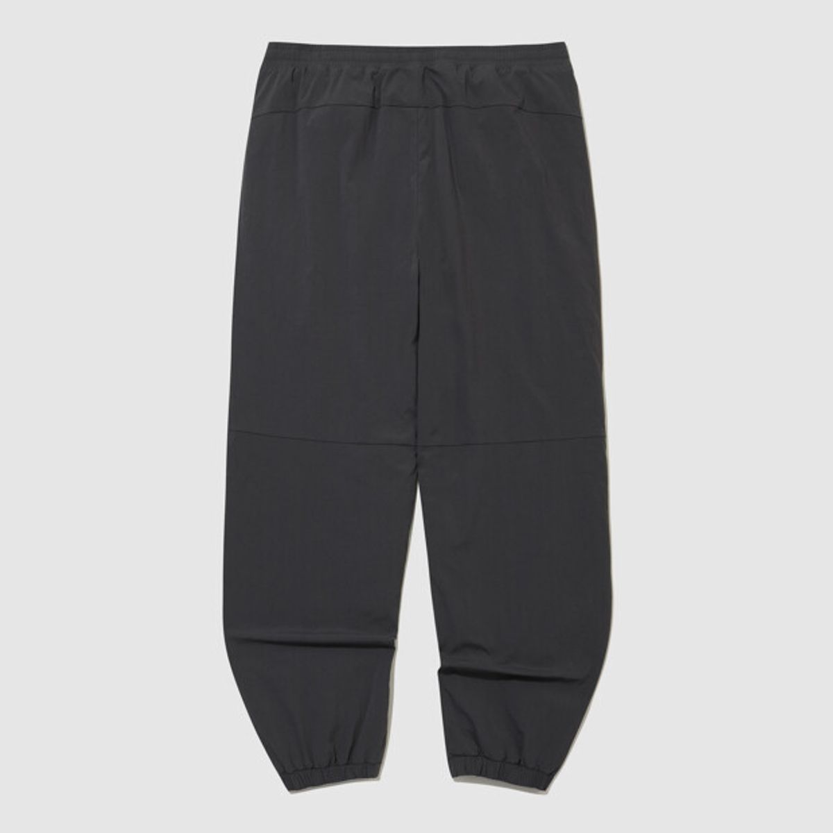 엄브로(UMBRO) 아이코닉 웜업 우븐 팬츠 챠콜 UR321SPT99