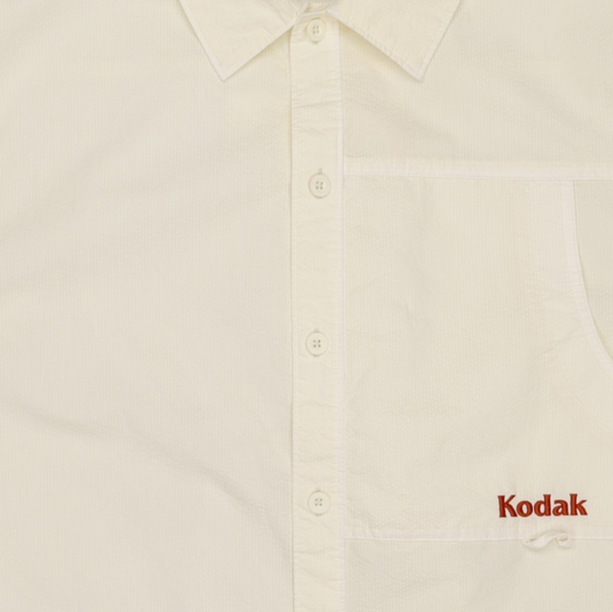 코닥(KODAK) 트립 네이쳐틴트 시어서커다잉 반팔 셔츠 IVORY M