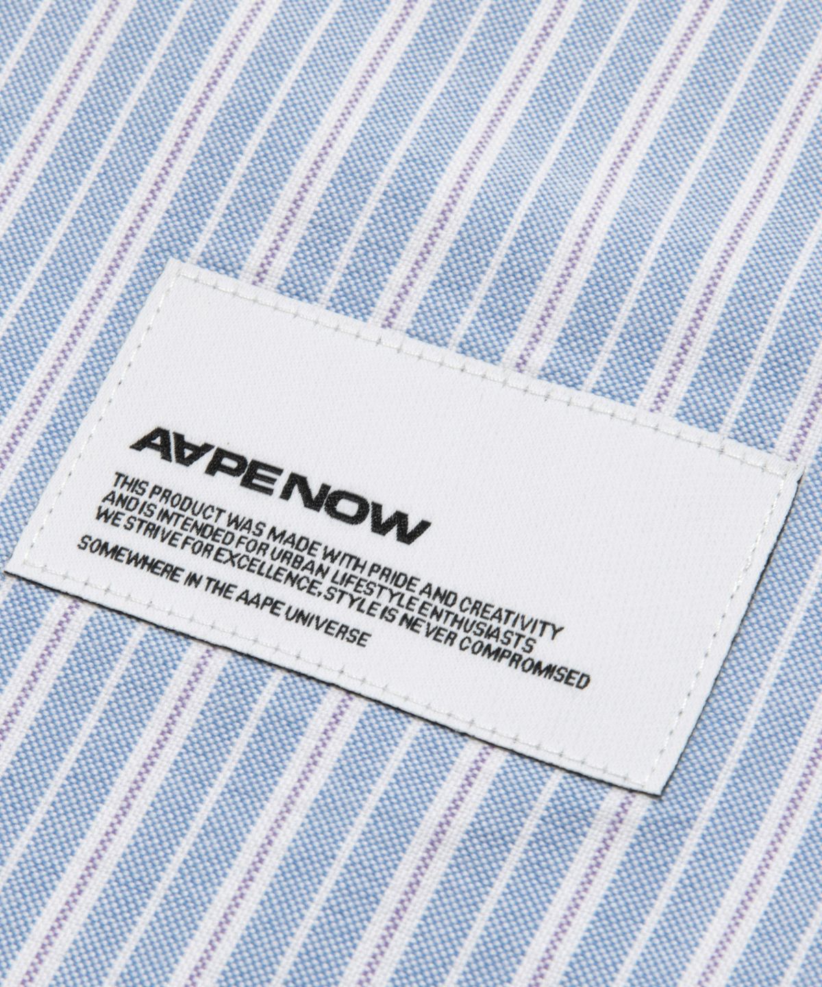 에이프(AAPE) AAPENOW Moonface 스트라이프 긴팔 셔츠 블루 / AAPSTM8584XXRBLA