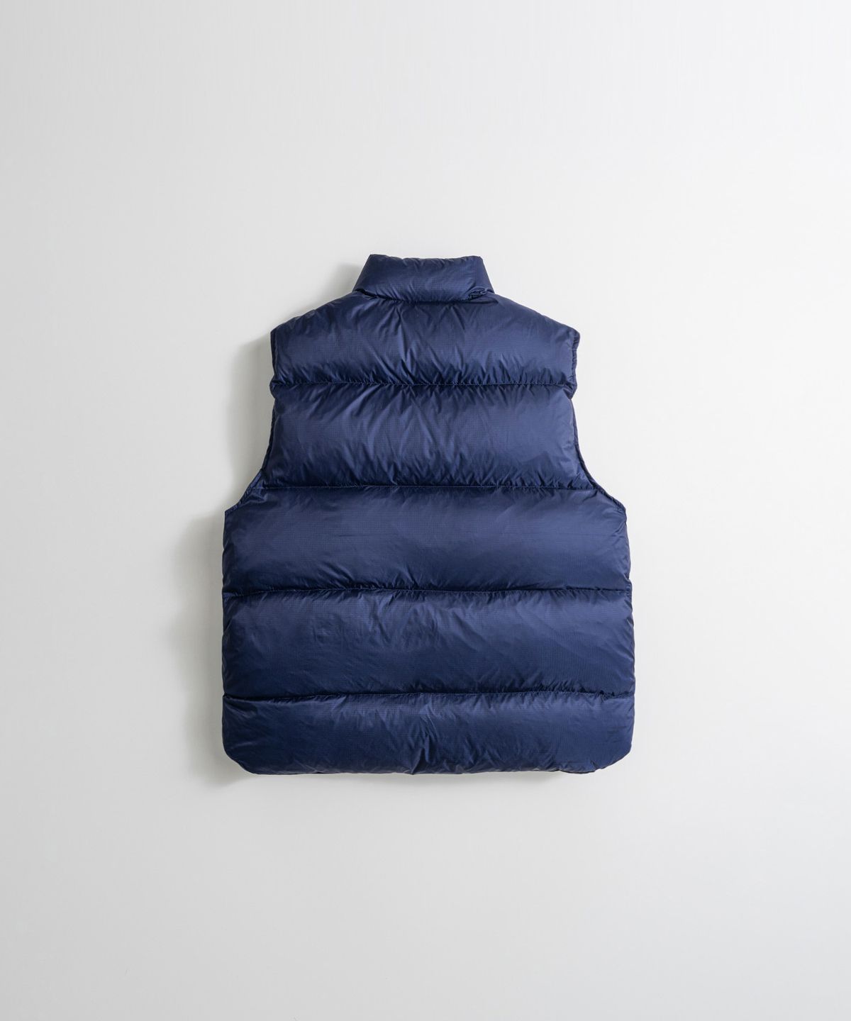 비헤비어(BEHEAVYER) REVERSIBLE DUCK DOWN VEST navy/black