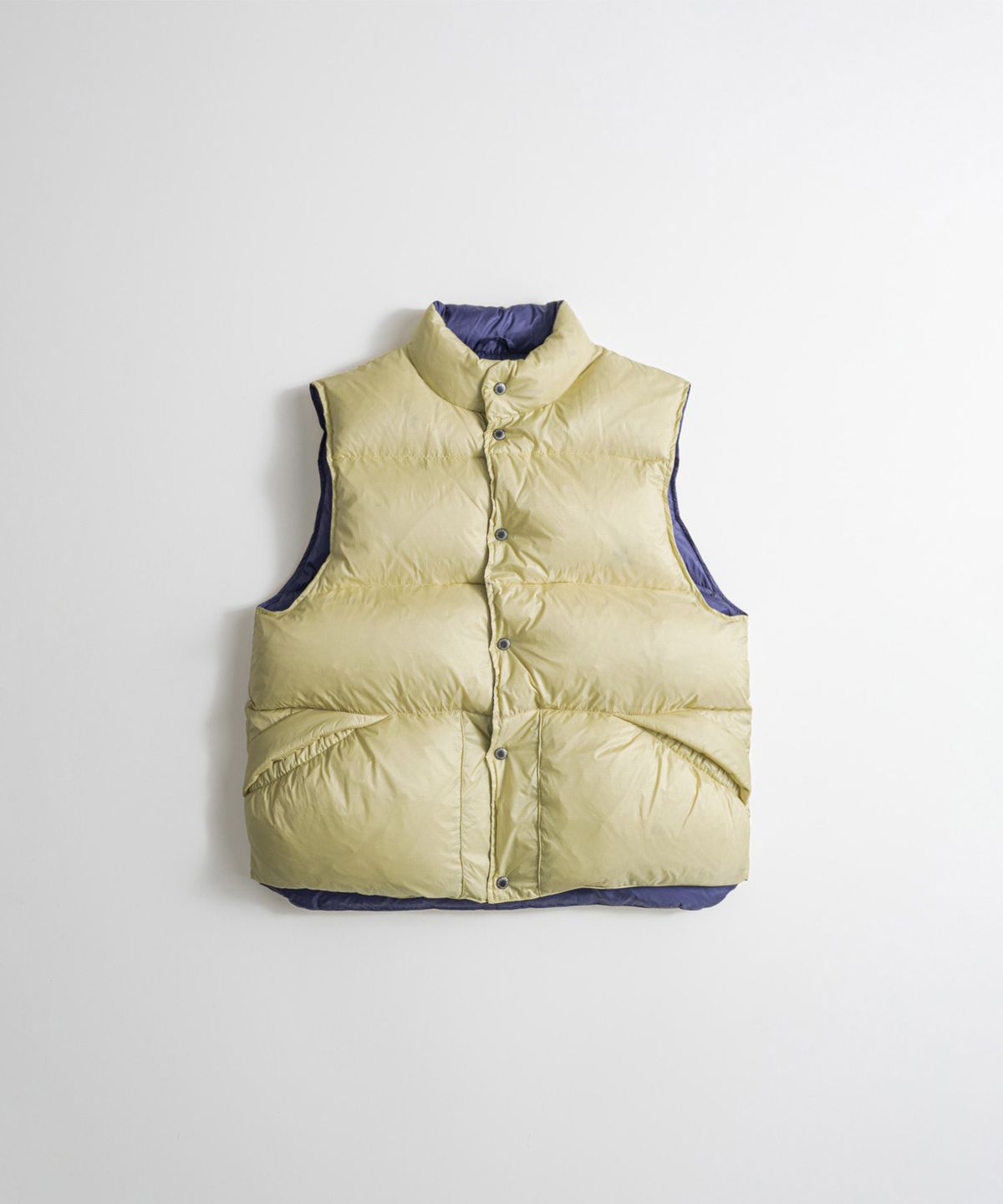 비헤비어(BEHEAVYER) REVERSIBLE DUCK DOWN VEST lemon/l.purple