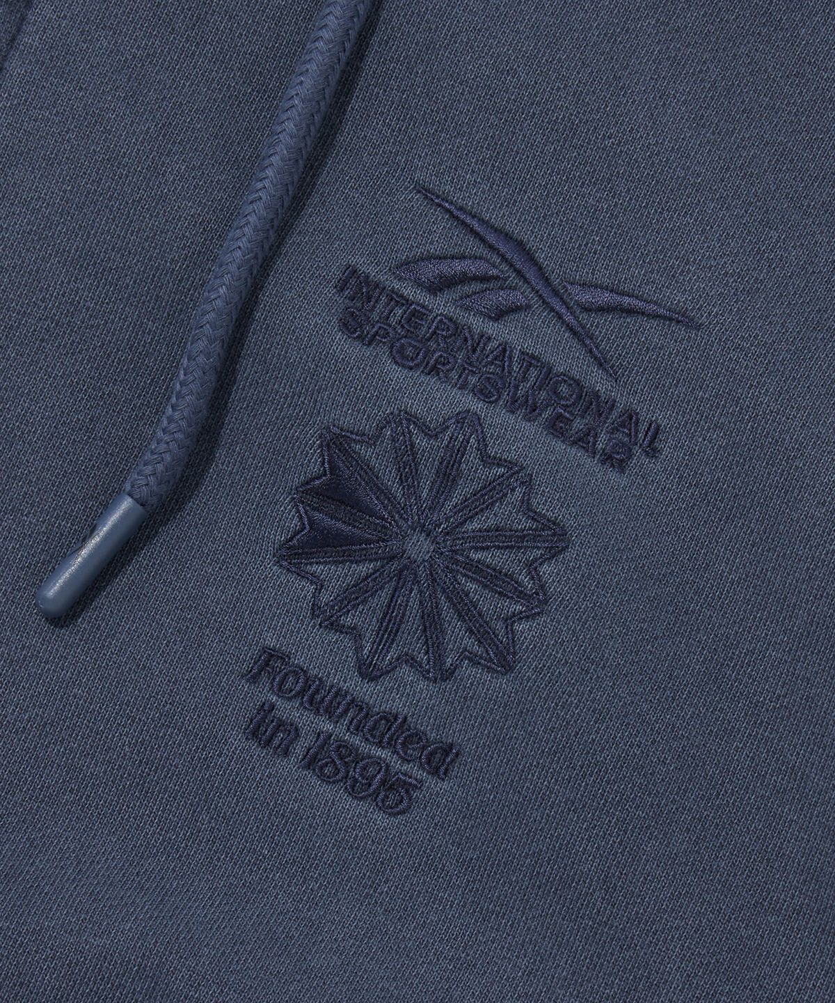 리복(REEBOK) 가먼트다잉 스타크레스트 후드 집업 - 인디고