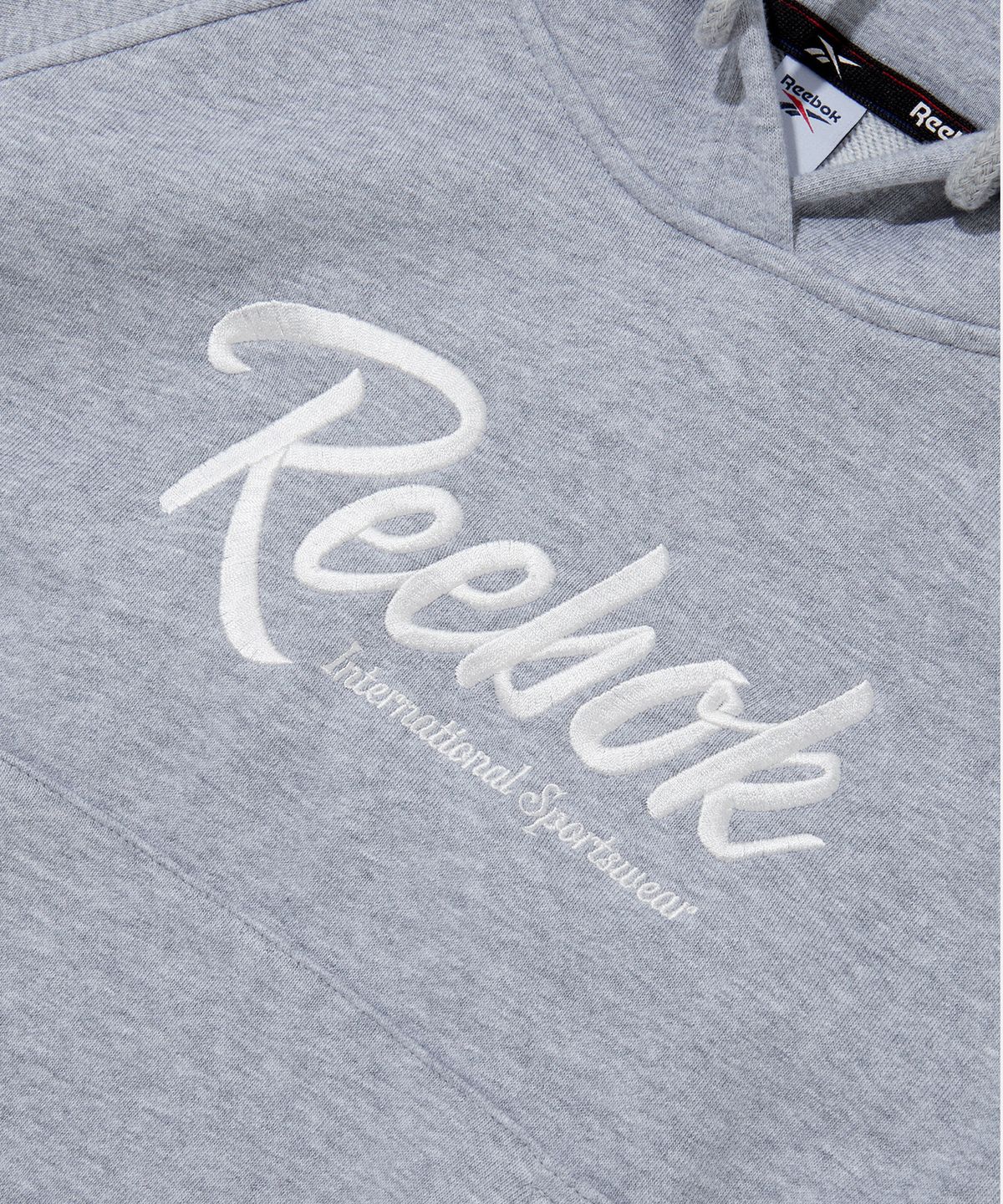 리복(REEBOK) 세미 크롭 후디 (W) - 멜란지 그레이