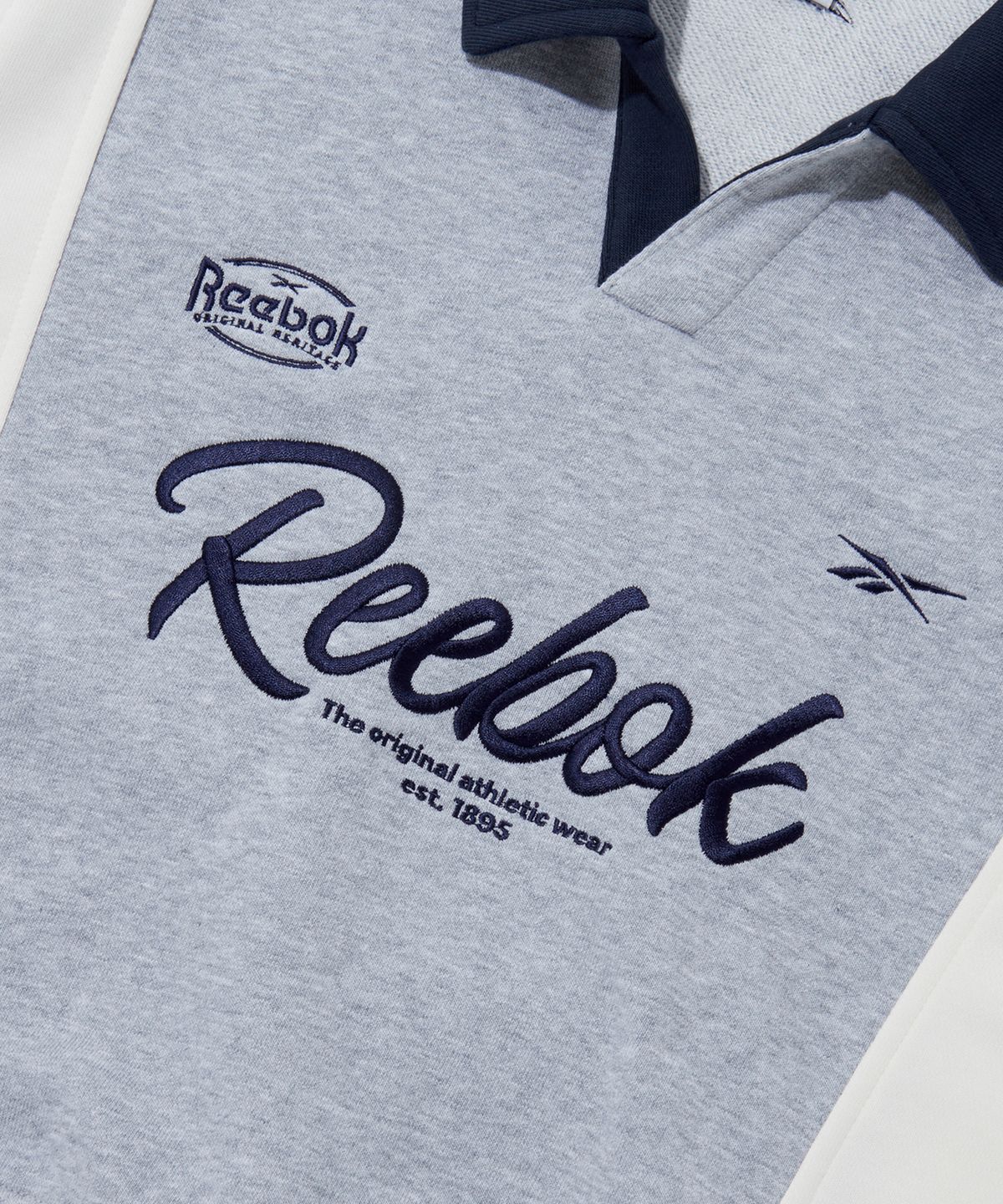 리복(REEBOK) 스포티 카라 맨투맨 (W) - 멜란지 그레이