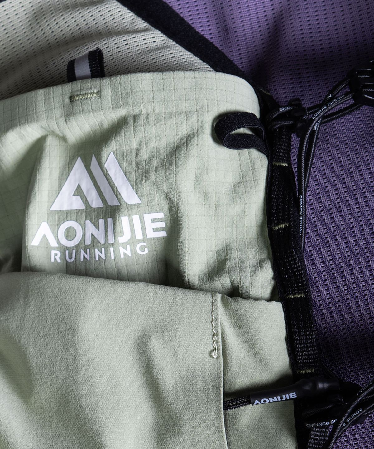 오니지(AONIJIE) 트레일러닝 베스트 엘리트 V10 (Purple Green)