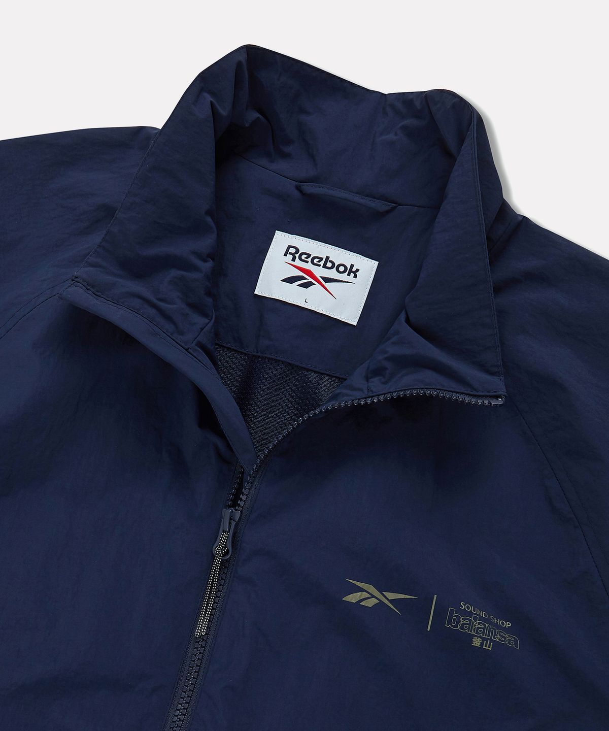 리복(REEBOK) [리복x발란사] 우븐 트랙 자켓 - 네이비