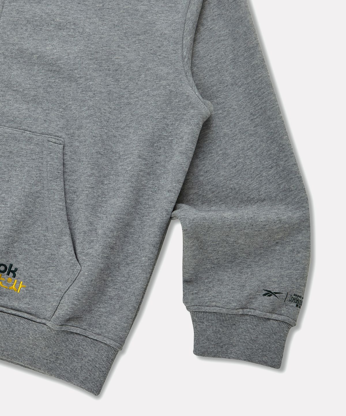 리복(REEBOK) [리복x발란사] 그래픽 후드 집업 - 그레이